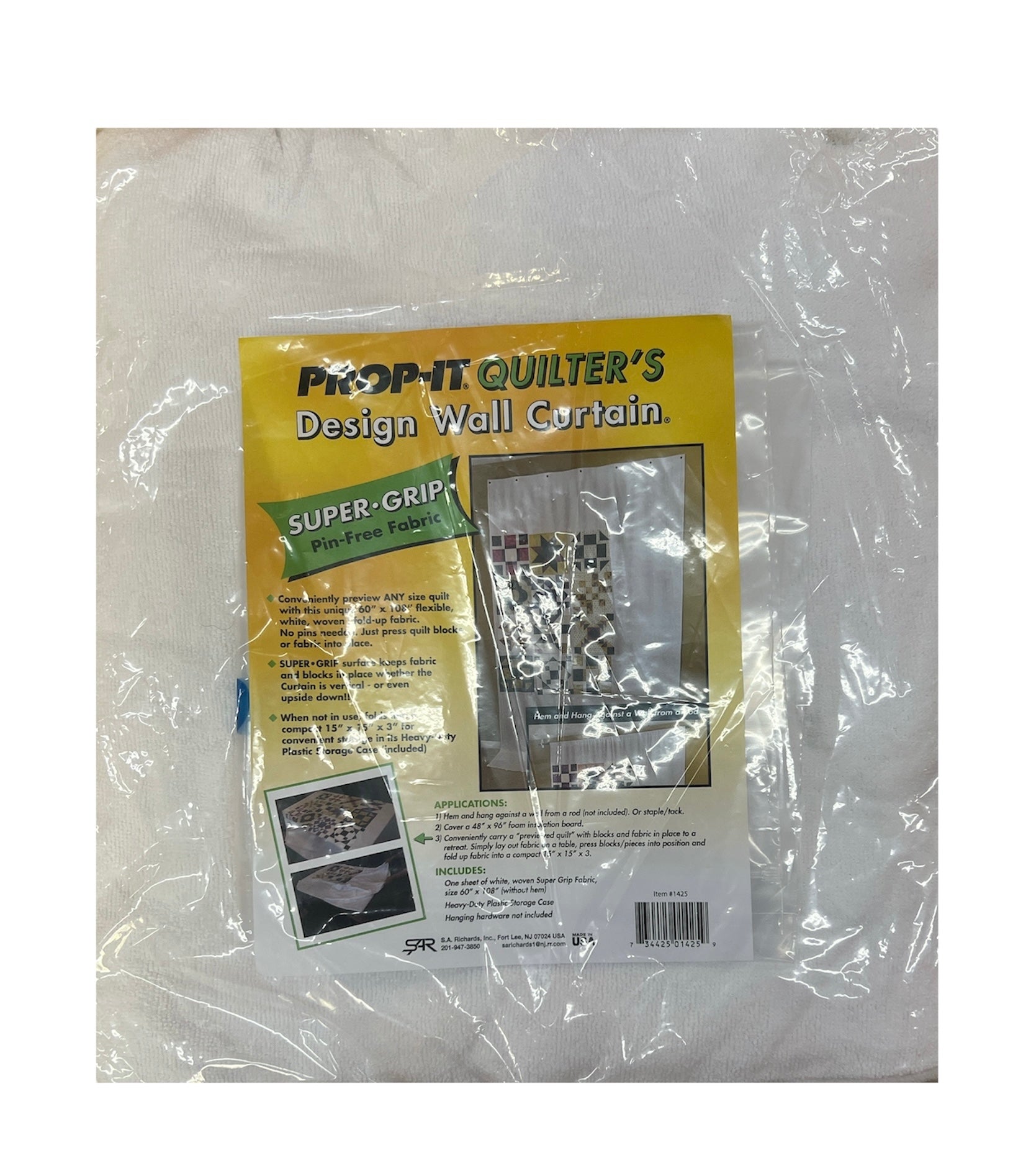 Packaged Prop-It Quilter's Design Wall Curtain with yellow label on a white background